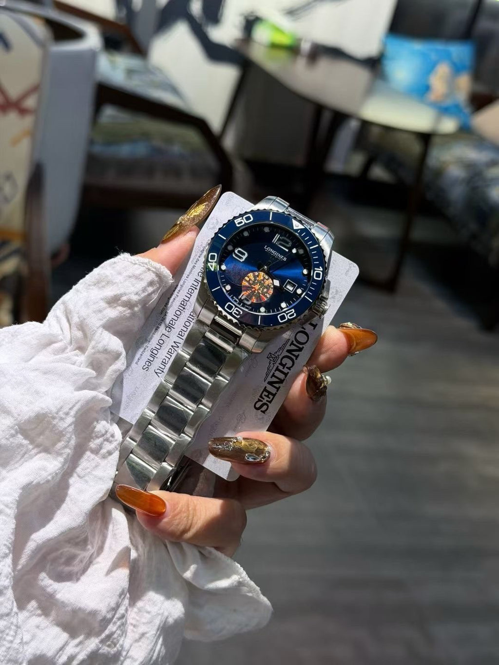Longines Blue Bezel Link Bracelet Watch